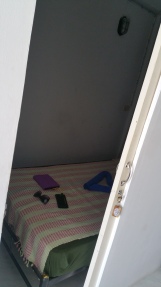 My tiny closet-room. It's a sweltering, toe stubbing good time!